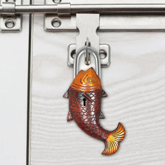 Antique fish-shaped padlock showpiece with key, multicolor on a brass lock body