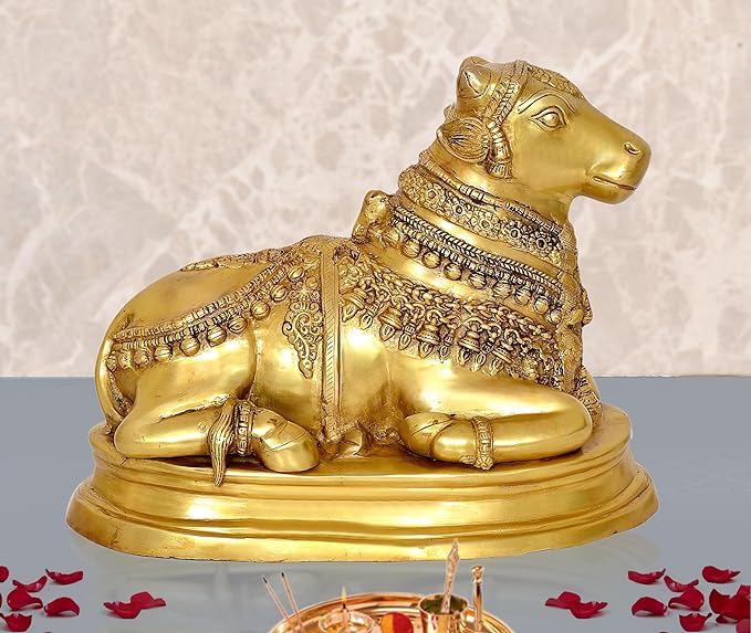 Brass Nandi cow statue idol on circular base, ornate engraved collar and ornaments