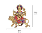 Brass Durga statue on lion with height and width measurement lines shown