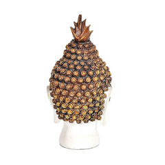 Resin Buddha head decor rear view, brown-gold beaded bun with raised finial, white head