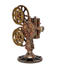 Resin steampunk projector statue angled view, brass gears and mechanical panel details