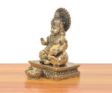 Brass Kuber figurine (6 in), side view of crowned deity seated on ornate base