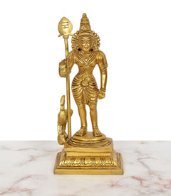 Brass Kartikeya murti standing on pedestal, spear raised, detailed face and ornaments