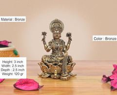 Bronze Lakshmi murti on lotus base, detailed crown and jewelry; 3 inch height