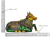 Brass Nandi bull statue with size markings, green and gold ornate details, height 6 inch