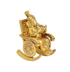 Golden brass seated Ganesha on rocking chair, detailed wheel base, side view