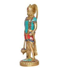 Brass Hanuman standing idol turned slightly, turquoise vest with red panels and jewelry