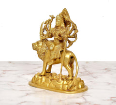 Durga Maa on lion brass statue, golden finish, rear three-quarter view