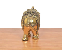Bronze elephant figurine rear view, circular medallion on back and jeweled legs
