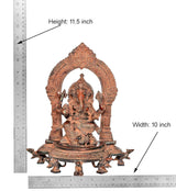 Brass Ganesh sculpture: 11.5 in tall, 10 in wide; arched halo, Abhaya mudra