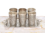 AONA German-silver set: six embossed cups and one ornate tray, leafy floral relief