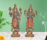 Brass standing Maa Lakshmi & Vishnu idol, multicolor jeweled attire, raised arms