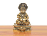 Brass Kuber figurine (6 in), seated cross-legged on decorated platform, blessing hands