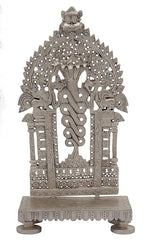 Antique brass deity throne chowki with Vasuki serpent, ornate cutout details front view