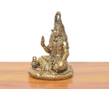 Brass Lord Shiva statue side view, raised blessing hand, trident and beaded robe, lion
