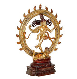 Brass Shiva Nataraj idol angled view, dancing figure with circular halo and detailed base