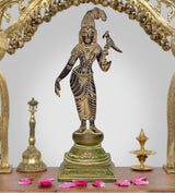 Brass Hindu goddess statue with parrot, standing on green base