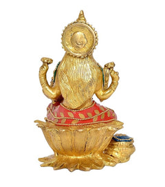 Lakshmi brass statue back view on lotus, gold finish with red skirt and blue base
