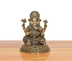 Superfine Brass Ganesh statue, front view with trident-like hand emblems