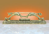 Brass Jai Shree Ram Dhanush pooja showpiece with engraved central panel and scrollwork
