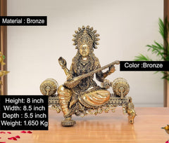 Bronze Saraswati idol on throne, veena in hands, height 8 inch, ornate crown