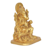 Golden Lord Ganesha statue idol, side view with textured base and arched halo