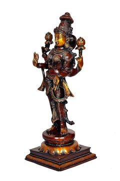Lakshmi-Messingidol in Seitenansicht, stehende Pose mit erhobenen Händen und Turmkrone