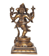 Brass dancing Ganesha statue with lotus-like chest ornament and arched arm pose