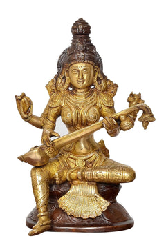 Front view brass Saraswati statue seated with veena, ornate crown and halo details