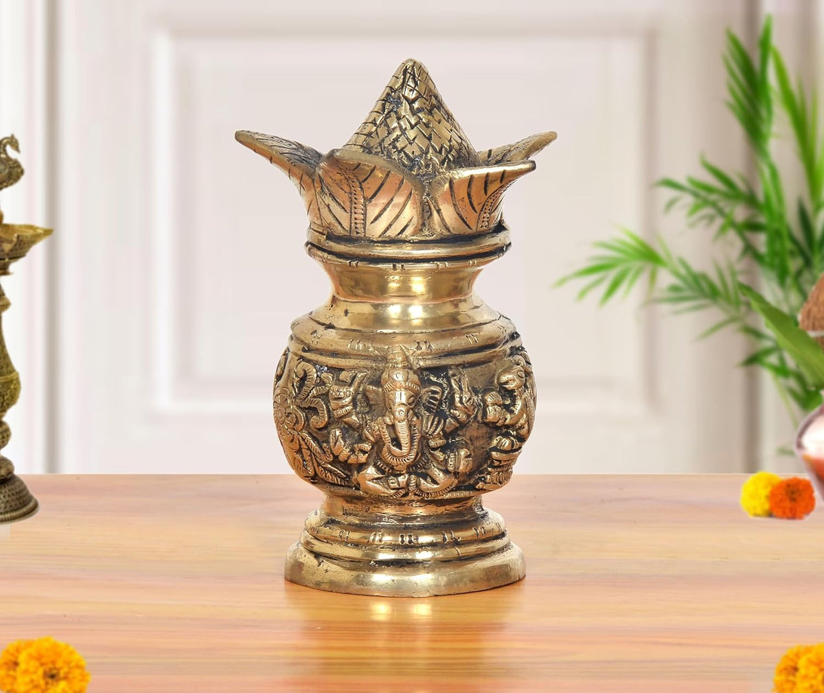Brass kalash showpiece with carved Lakshmi & Ganesh, 6 in height