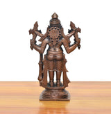 Back view copper Lord Narasimha standing idol, four arms with weapons