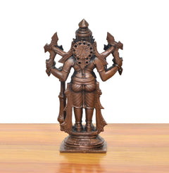 Back view copper Lord Narasimha standing idol, four arms with weapons