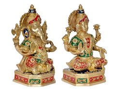 Brass Lakshmi Ganesh statue side view, ornate pedestal base with painted patterns