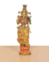 Radha Rani brass idol with colorful meenakari patterns and raised hands.