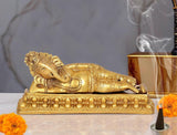 Brass relaxing Ganesha statue on ornate base, 3.5 inch home mandir decor