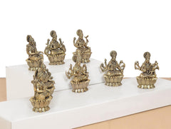 Brass Lakshmi idol set of 8, seated Lakshmi figures with detailed jewelry