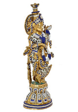 Brass Radha Krishna idol front three-quarter, holding pose, blue and jeweled attire