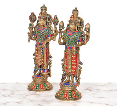 Brass Maa Lakshmi and Vishnu idol pair, close angled view, jeweled crowns and hands
