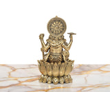 Back view brass Lord Vishnu idol, lotus base and circular halo medallion