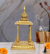 Brass pooja mandir with finial, four pillars and open platform; 13 inch height