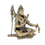 Brass Shiva statue holding trident, seated pose, detailed necklace and arm ornaments