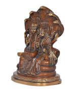 Side view brass Lakshmi-Vishnu statue on Sheshnag, textured robes and crowns