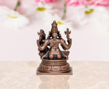 Rear view copper Lakshmi Narasimhar idol, hands raised with decorative back details