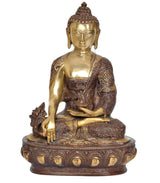 Meditating Buddha idol in dhyan mudra, brass-gold figure on patterned round base