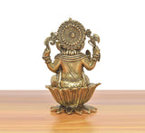Bronze Lord Ganapati Bappa idol, rear view with circular back ornament and lotus base