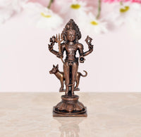 Shree Kal Bhairav idol in copper tone, raised hands and trident-like weapons on base