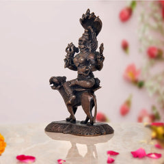 Pratyangira Devi copper statue rear view, seated on bull with raised trident arms