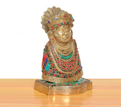 Khatu Shyam brass idol three-quarter view with colorful beadwork and engraved base