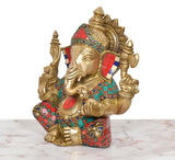 Brass Ganpati Bappa murti side view, multicolor red-blue patterns and jeweled details