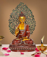 Seated golden Buddha with green leaf canopy decorative showpiece